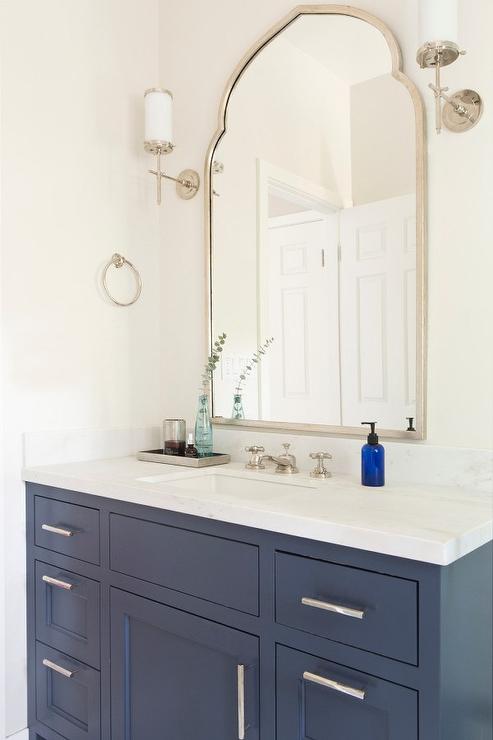 BLue Bath Vanity with Uttermost Kenitra Arch Wall Mirror .