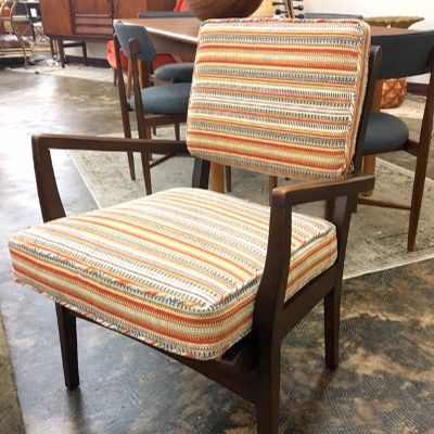 Cool side chair from the 1950-60s with new striped cushions .