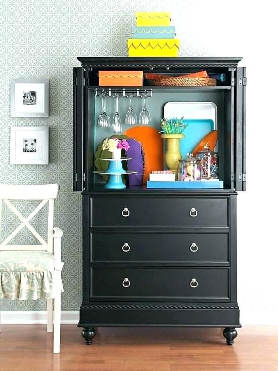 Flat Screen Tv Armoire With Pocket Doors | Small space storage .
