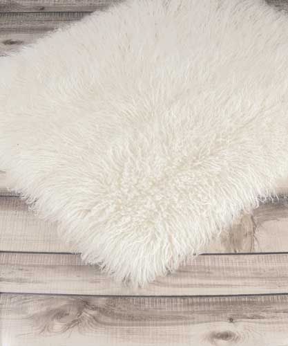 FlokatiRug White Solid Color Shag Rug 3 from the Flokati Rugs .