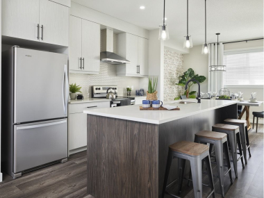 Gather at the island in Mesa's central galley kitchen | Calgary Hera