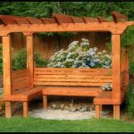 Lovely arbor with a built-in bench. This isn't exactly the kind of .
