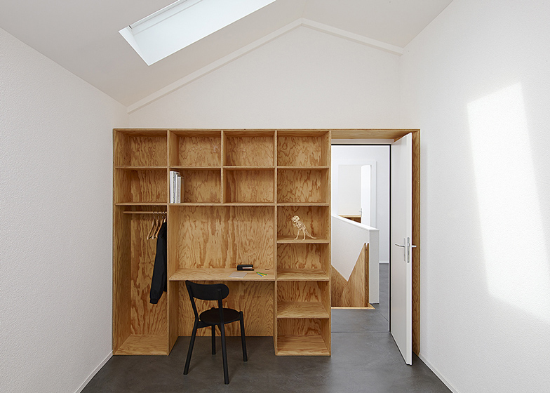 Eclépens apartment interiors with boxy wooden furniture by Big-Ga