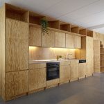Eclépens apartment interiors with boxy wooden furniture by Big-Ga