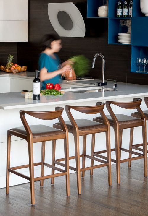 The Duda Stool (counter height) by Brazilian Aristeu Pires warms .