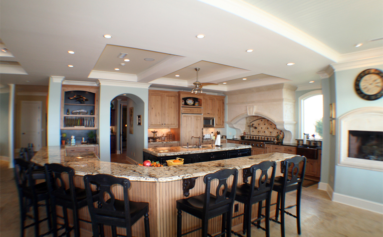The Kynochs Kitchen: large kitchen island with seating and storage .