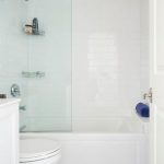 White Guest Bathroom with Large Gray Hexagon Floor Tiles .