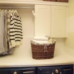 add a cabinet, shelf, and rod, and you have instant laundry room .