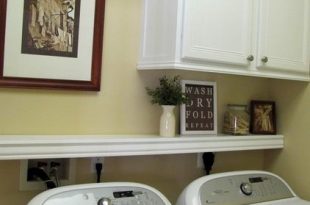 Laundry room ideas - cabinet, shelf, and hanging rod. I like this .