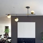 Mid-Century Modern 3 Light Linear Ceiling Light in Black and Brass .