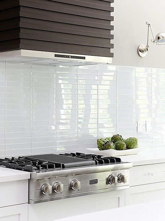 Longer subway tiles are stacked horizontally for a look that's .