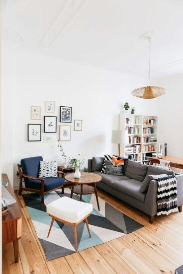 Love this simple modern living room and dining room combined .