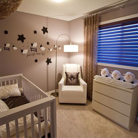 Decorate a gender-neutral nursery with a lamb or sheep theme brown .