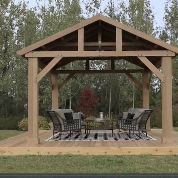 Create an extended space in house with outdoor wooden gazebo .