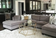 Gray sectional, black built ins and white shag rug | Rugs in .