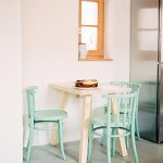 Small breakfast table with mint-green … – Buy image – 12473004 .