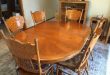 Solid Oak Oval/Round Dining Room Set w/6 Chairs. Table is 48 round .