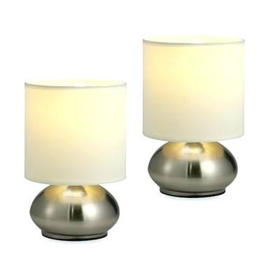 Different types of modern touch bedside table lamps .
