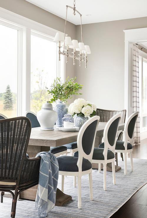 Black and White Round Back French Dining Chairs with Trestle Table .