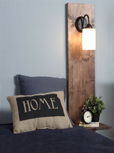 This bedside table includes a wall light and is perfect if you are .