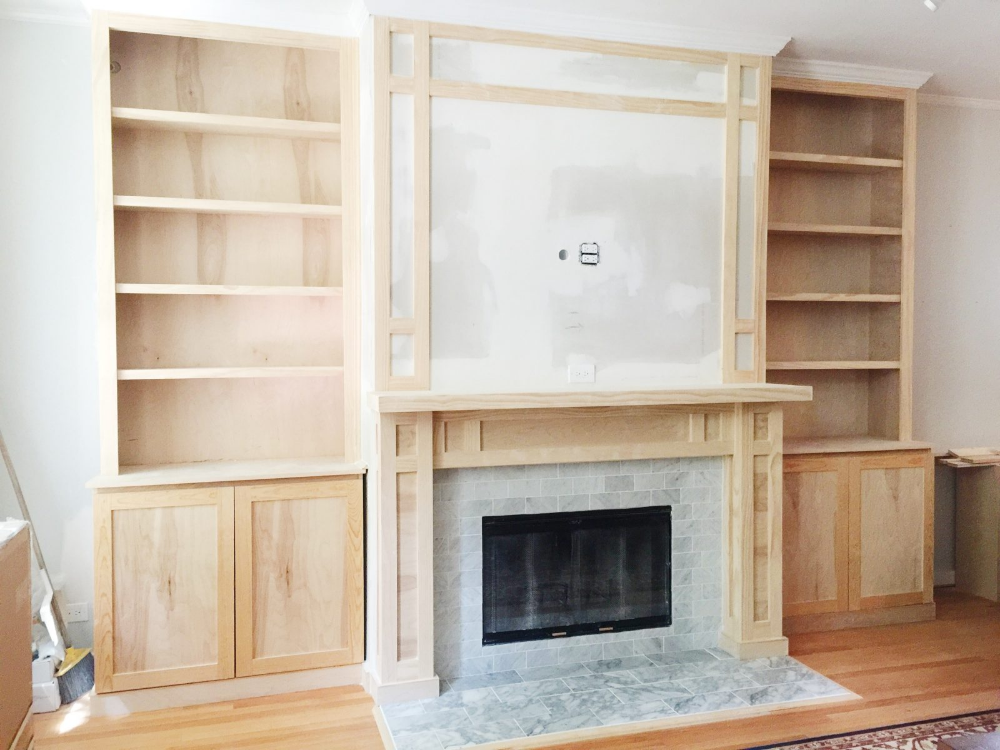 Beautiful Arrangement: Bookcases Surrounding the Fireplace