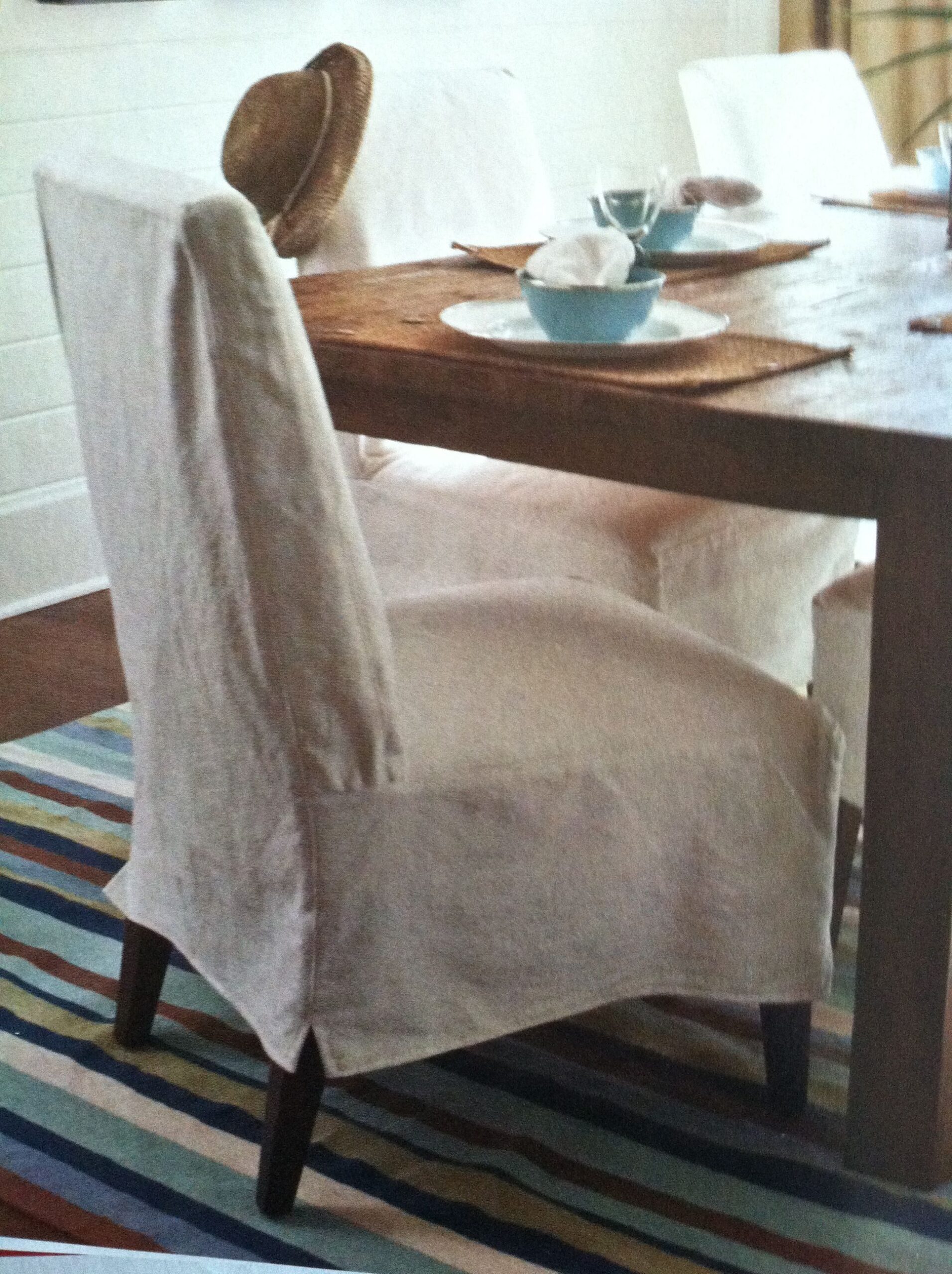 Elegant White Dining Room Chair Slipcovers: A Timeless Addition to Your Home