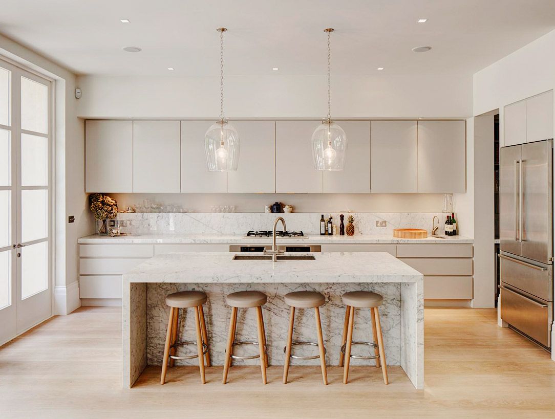 Sleek and Stylish White Kitchens with Beautiful Wood Floors