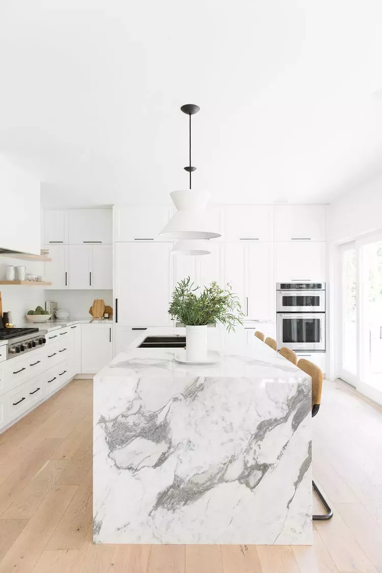 Sleek and Stylish: White Kitchens with Wood Floors for a Modern Look