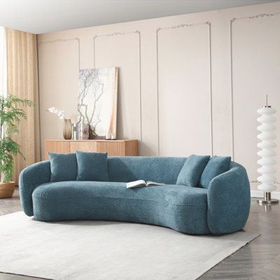 Space-Saving Solution: Embracing the Comfort of Curved Sofas for Small Living Areas