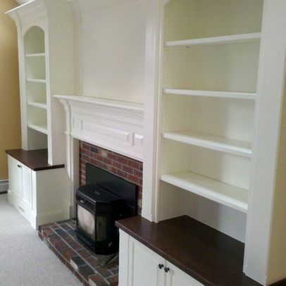 Stunning Bookcases Surrounding a Cozy Fireplace