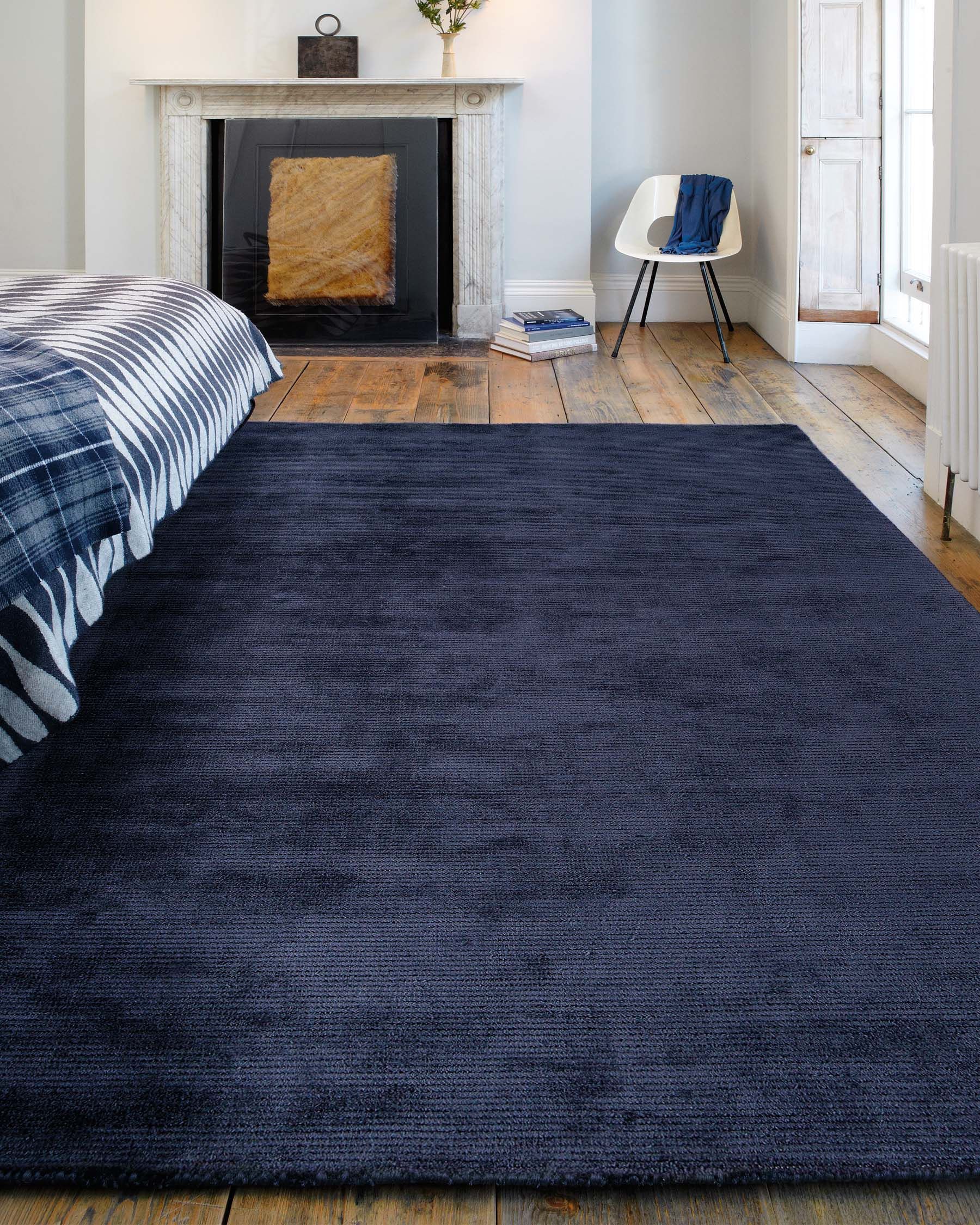 The Elegant Appeal of a Blue Carpet Bedroom